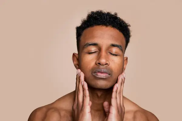 man doing skincare routine