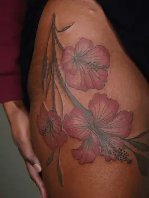 flower tattoos on upper thigh