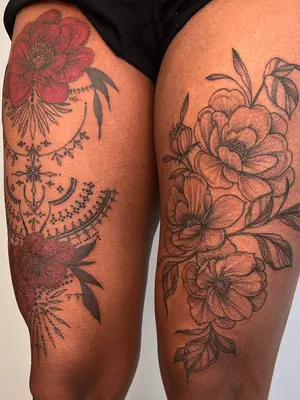 floral thigh tattoos 