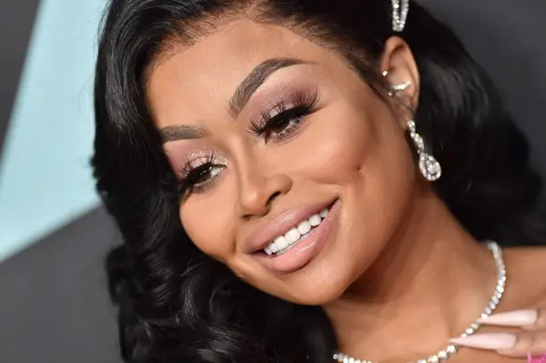 Blac Chyna with dimple piercing and glam makeup