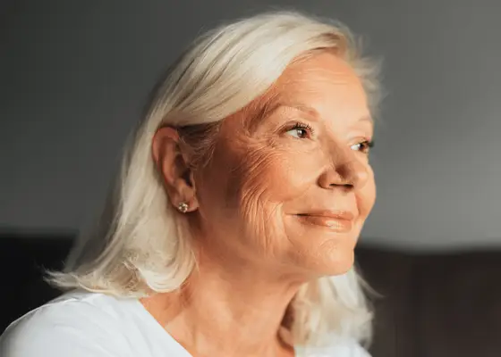 close up of woman with blonde hair and radiant skin