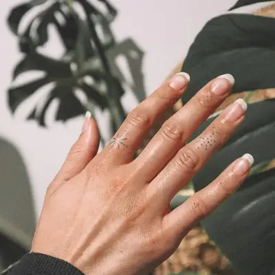Finger Tattoos for Women Starburst