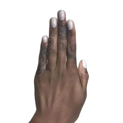 Close up of floral tattoos on hand