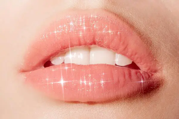 pink lips with glittery gloss 