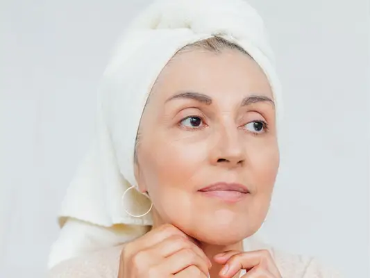 woman with towel on her head
