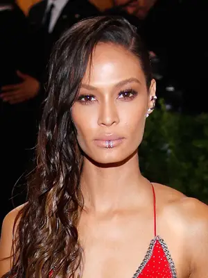 Joan Smalls wears lip piercing and ear cuff to the 2017 Met Gala