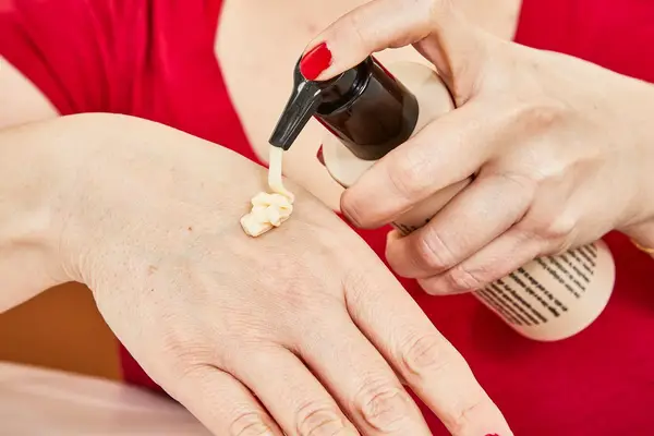 Augustinus Bader The Body Cream smeared on the back of a hand