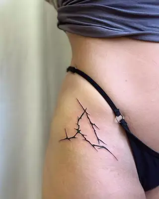 Image of an Aries inner arm tattoo