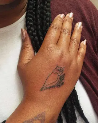 closeup of soul tattoo on hand