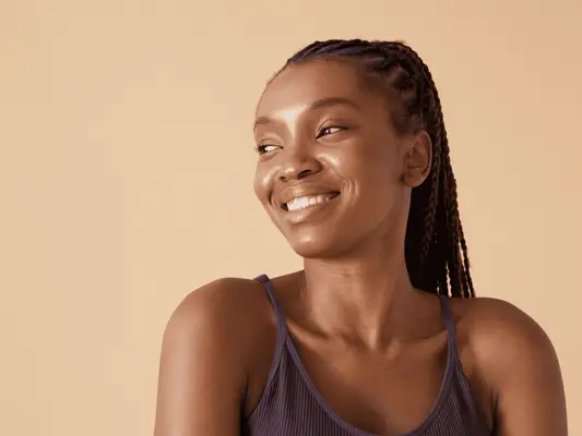 Close up of a woman with glowing skin