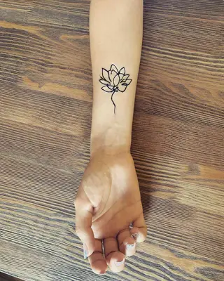 Image of an abstract lotus henna tattoo design