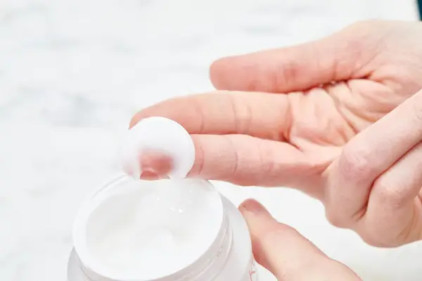 Jars of Innisfree Green Tea Hyaluronic Acid Hydrating Moisturizer displayed on white surface