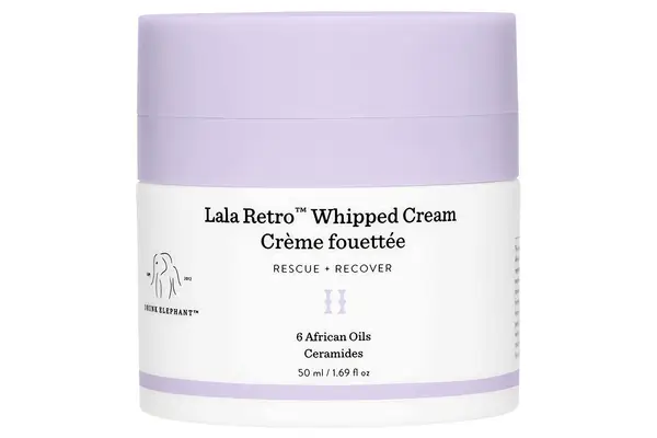 Person dips a finger into Kiehl