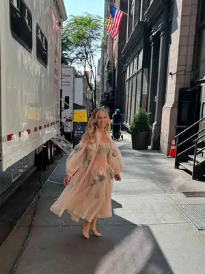 Photo of sheer turtleneck with red and pink rose design 