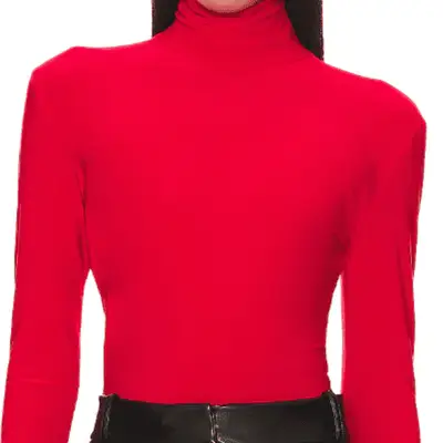 Photo of person wearing red turtleneck