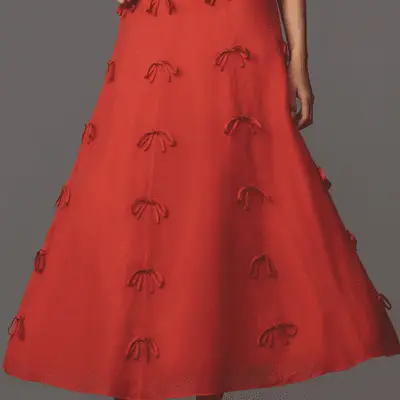 Photo of red full skirt with red bows 