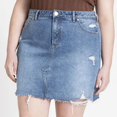 Eloquii Distressed Denim Mini Skirt on model