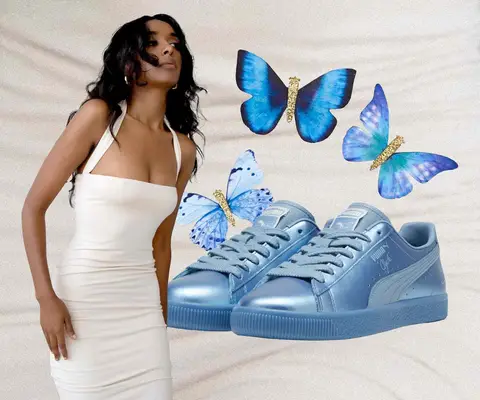 Chappell Roan Tour Good Luck Babe Outfit: white dress on model, butterfly hair clips, and blue sneakers