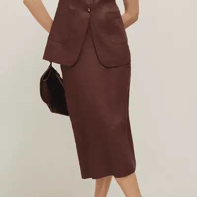 Ann Taylor The Clean Midi Skirt in linen blend in rich walnut chocolate brown on model