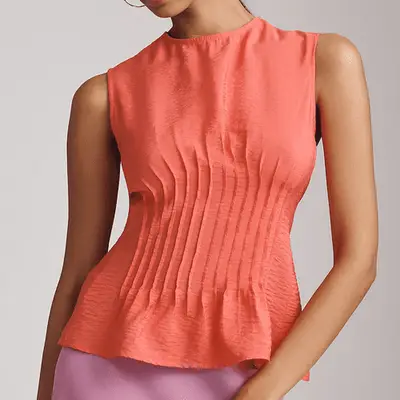 Anthropologie The Della Pleated-Waist Shell Top in red guava on model