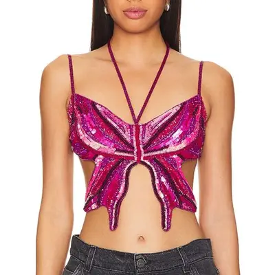 Model wearing a pink sequin butterfly top