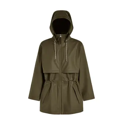 model wearing blue barrel denim jeans