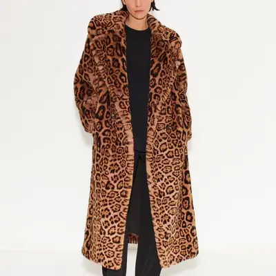 SimonMiller Cheetah Jetz Coat on model styled with all-black outfit
