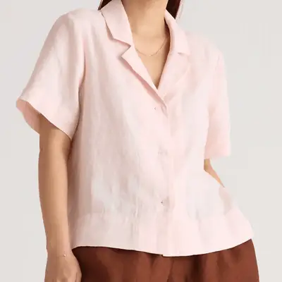 Quince European Linen Short Sleeve Shirt in pale pink on model