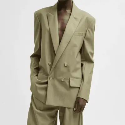 Sage green oversized double-breasted blazer on model