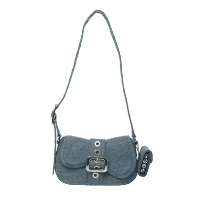 Blake Lively walking outside with blue denim chanel crossbody handbag