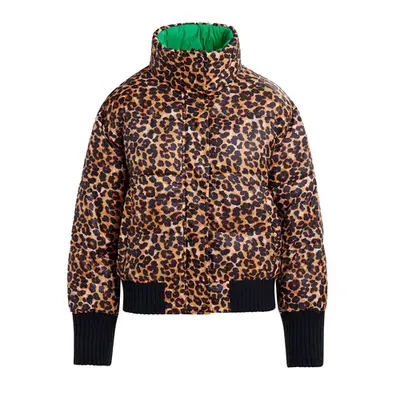 Close up of a model wearing a blue floral dress