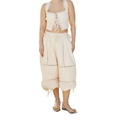 model wearing bloomers and an ivory top