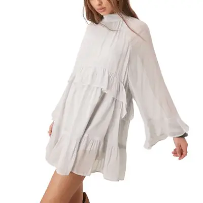 model wearing a ruffled mini dress