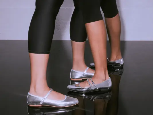 models wearng silver ballet flats
