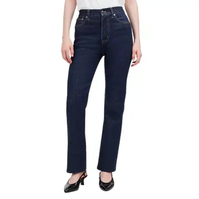 model wearing dark wash denim