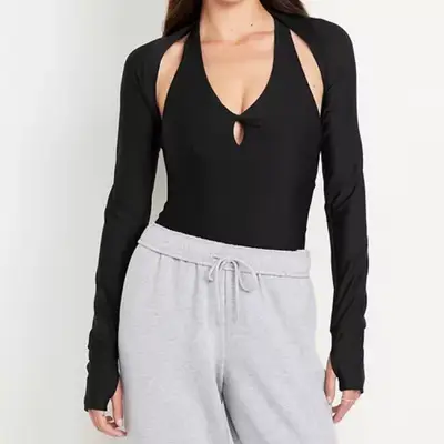 model wearing a black shrug