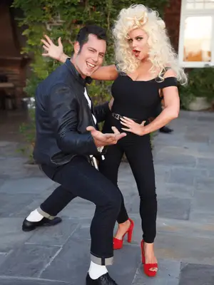 Jessica Simpson and husband Eric Johnson wearing Sandy and Danny costumes from Grease.