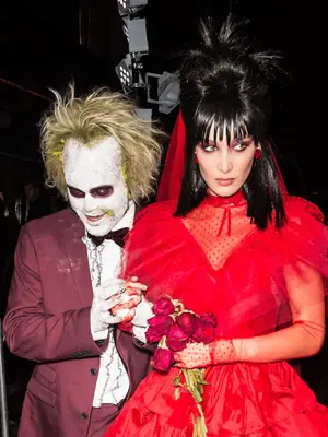 The Weekend and Bella Hadid dressed as Beetlejuice and Lydia from 