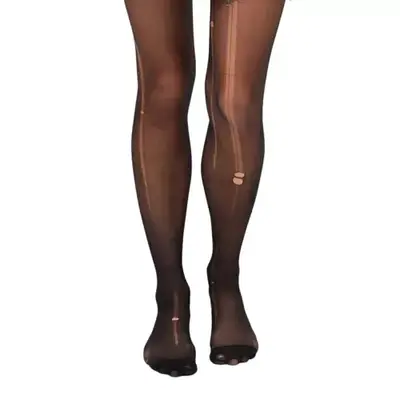 Model wearing ripped black tights