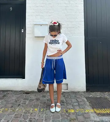 An influencer wearing gym shorts.