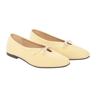 yellow ballet flats with a bow