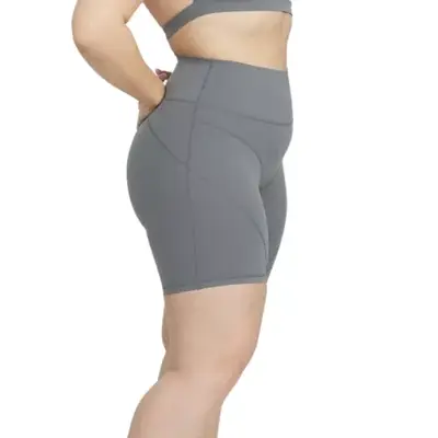 person wearing gray bike shorts