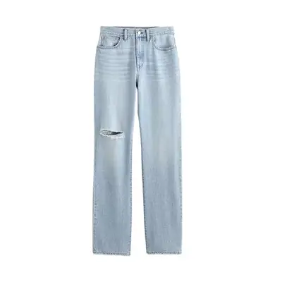 light wash Madewell jeans with small rip