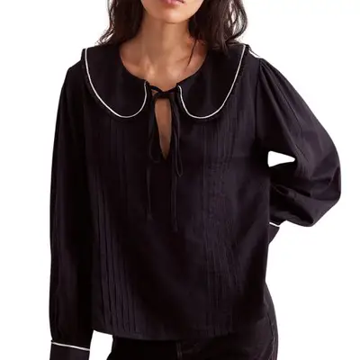 model wearing a sailor-collar black top