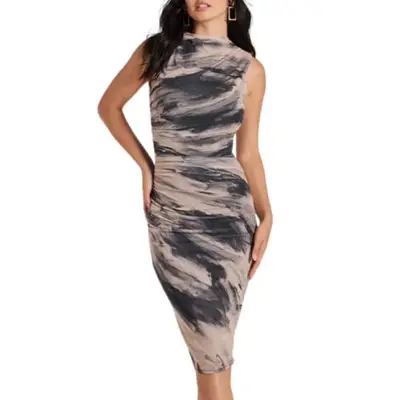 model wearing a printed abstract dress