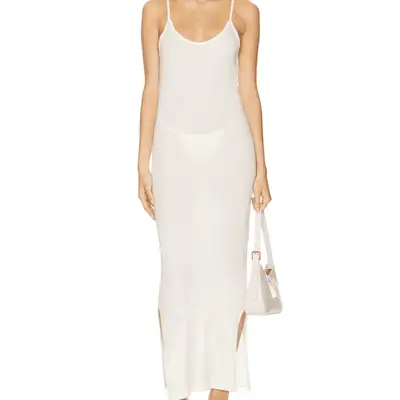 model wearing gray high waisted trousers