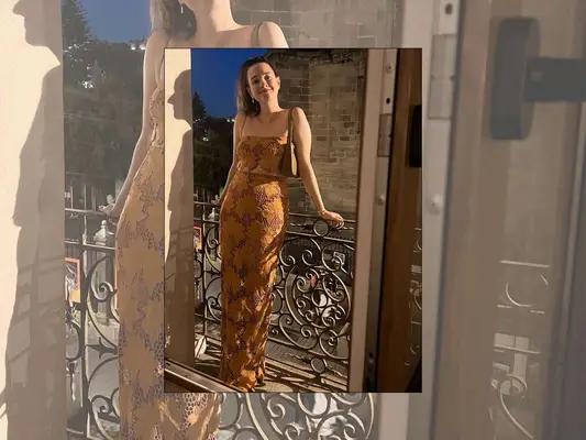 Erika Harwood wearing a skirt and crop top.