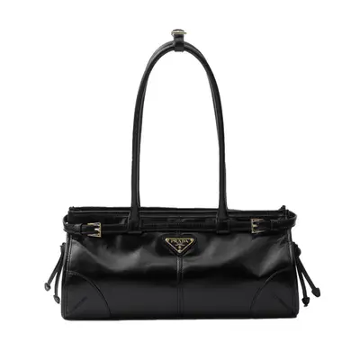 leopard print handbag with gold leopard head