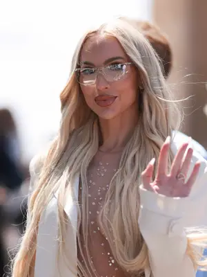 Christine Quinn wearing clear sunglasses