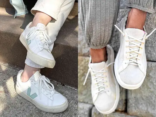 A person wearing the Veja Campo Sneakers next to a person wearing the Hey Dude Karina Sneaker